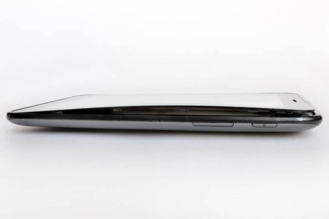 Tablet internals shown in context on a repair bench